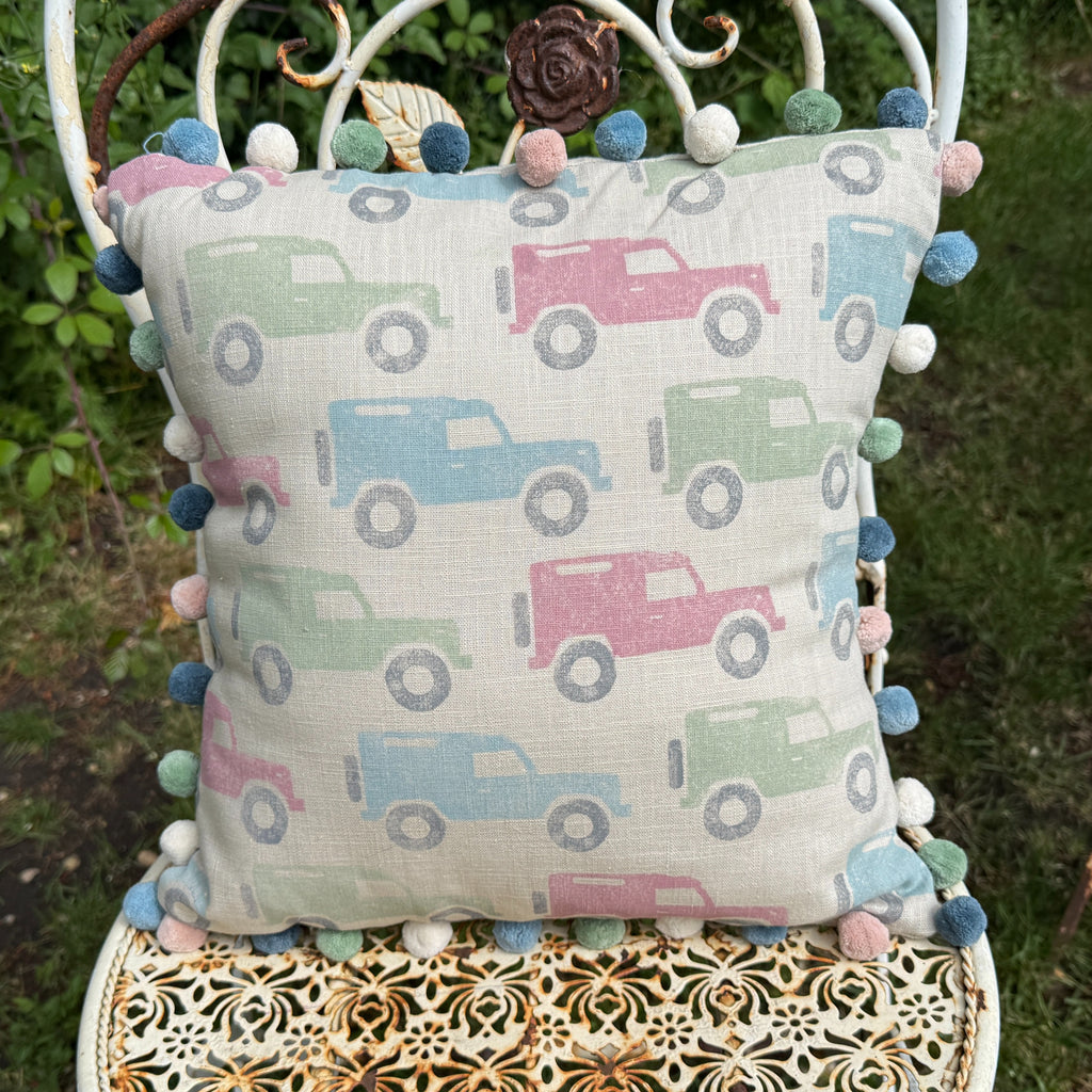 Pastel Land Rovers with Signature Pom Poms