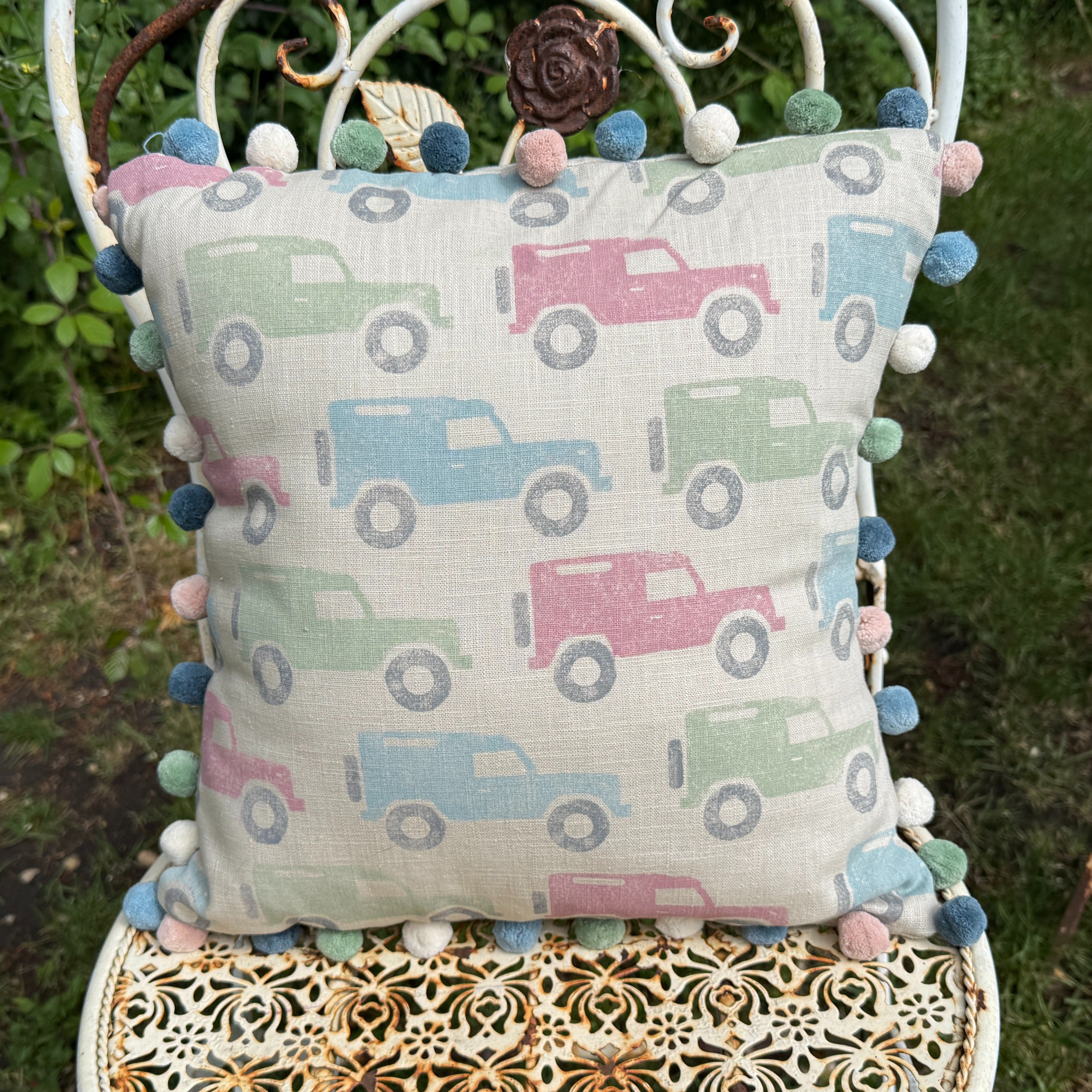 Pastel Land Rovers with Signature Pom Poms