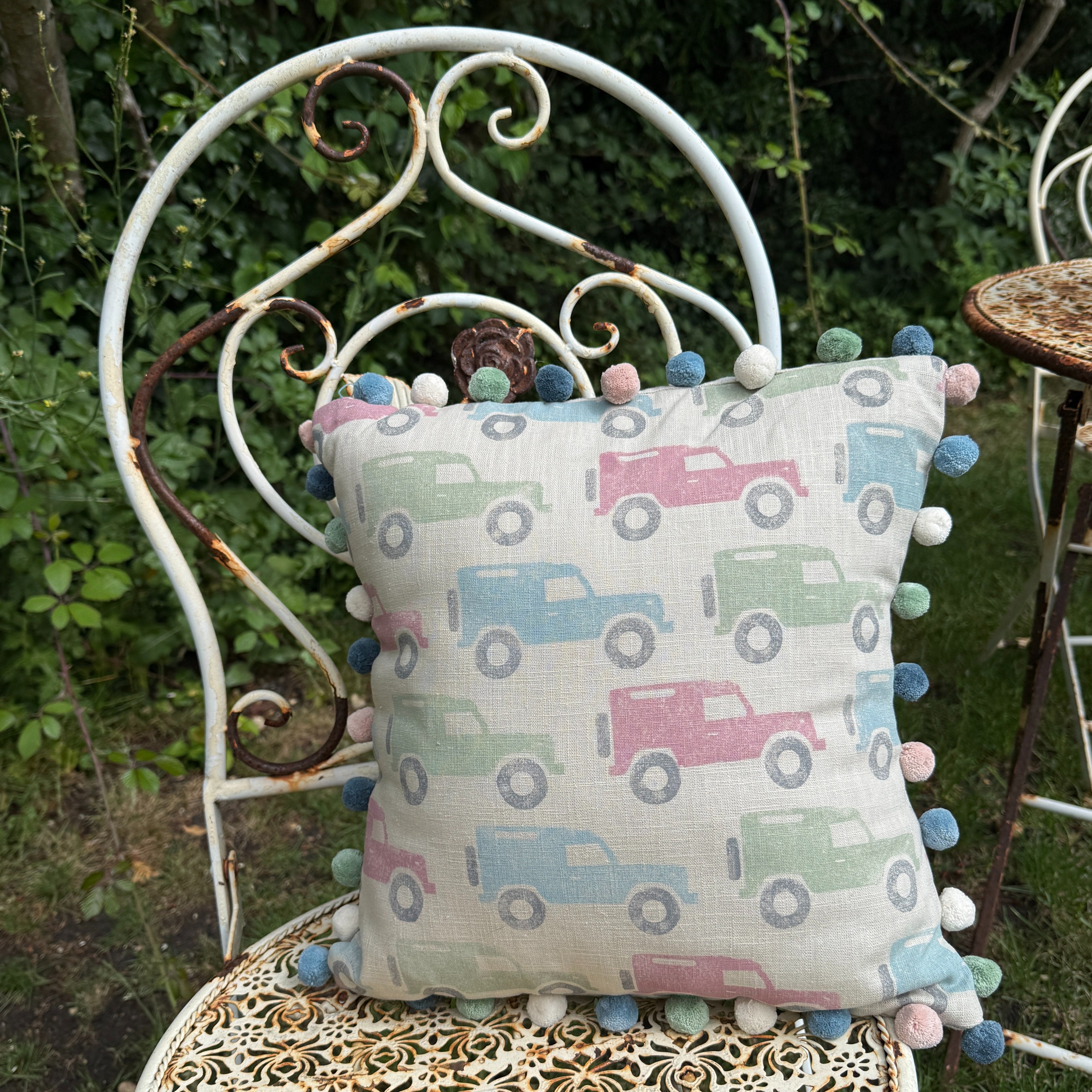 Pastel Land Rovers with Signature Pom Poms