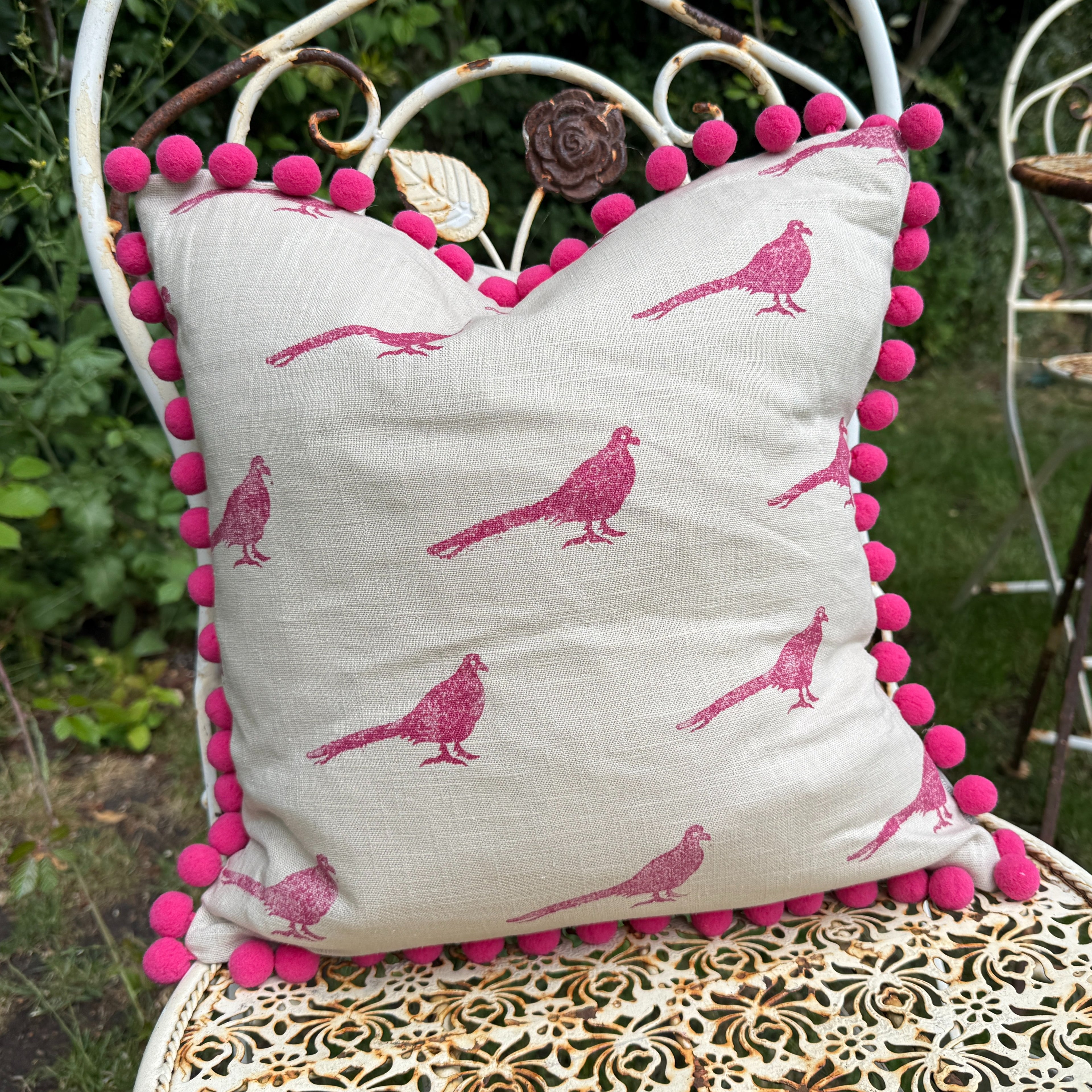 The Bold Pheasant Cushion - Raspbery Pom Pom