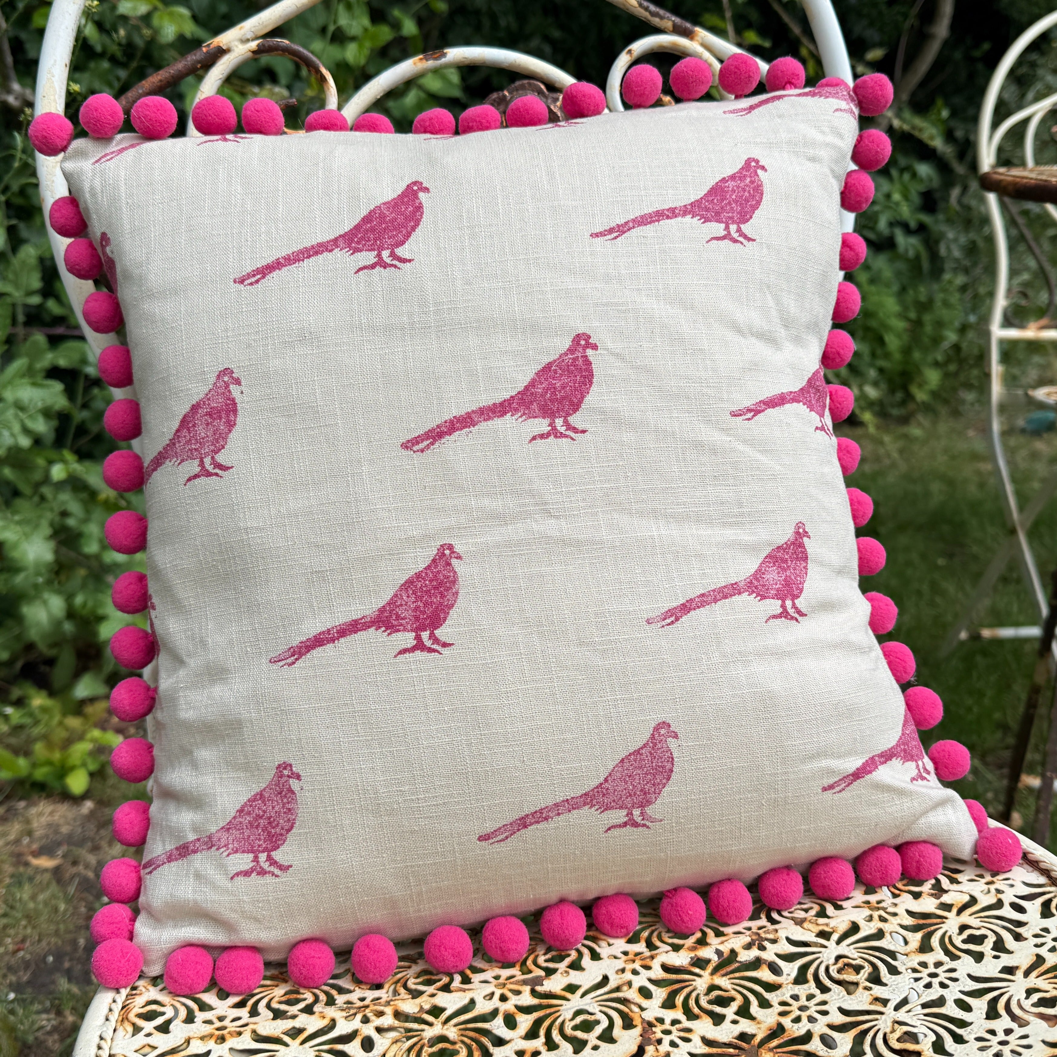 The Bold Pheasant Cushion - Raspbery Pom Pom