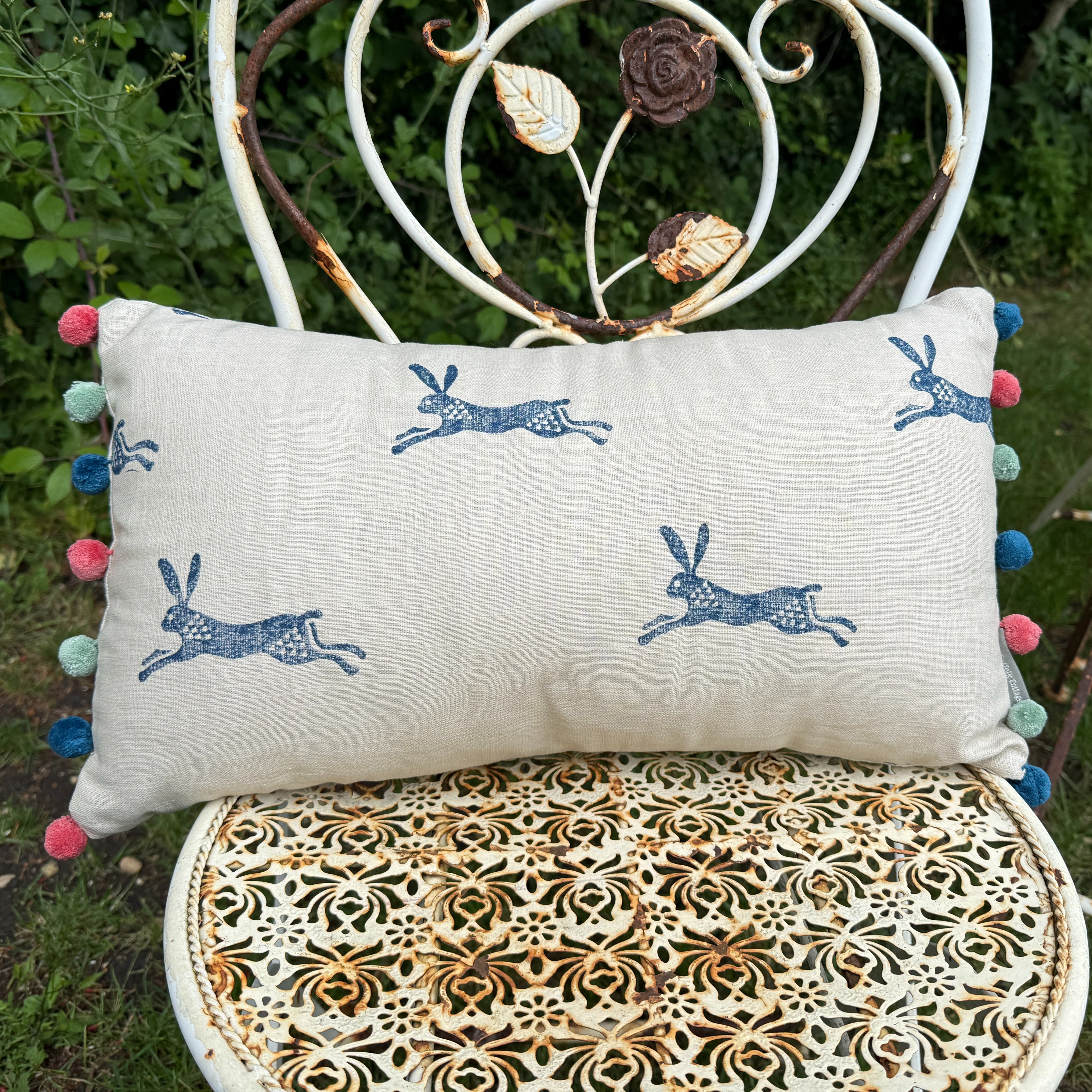 Running Hare Cushion - Pink, Navy & Aqua Pom Poms