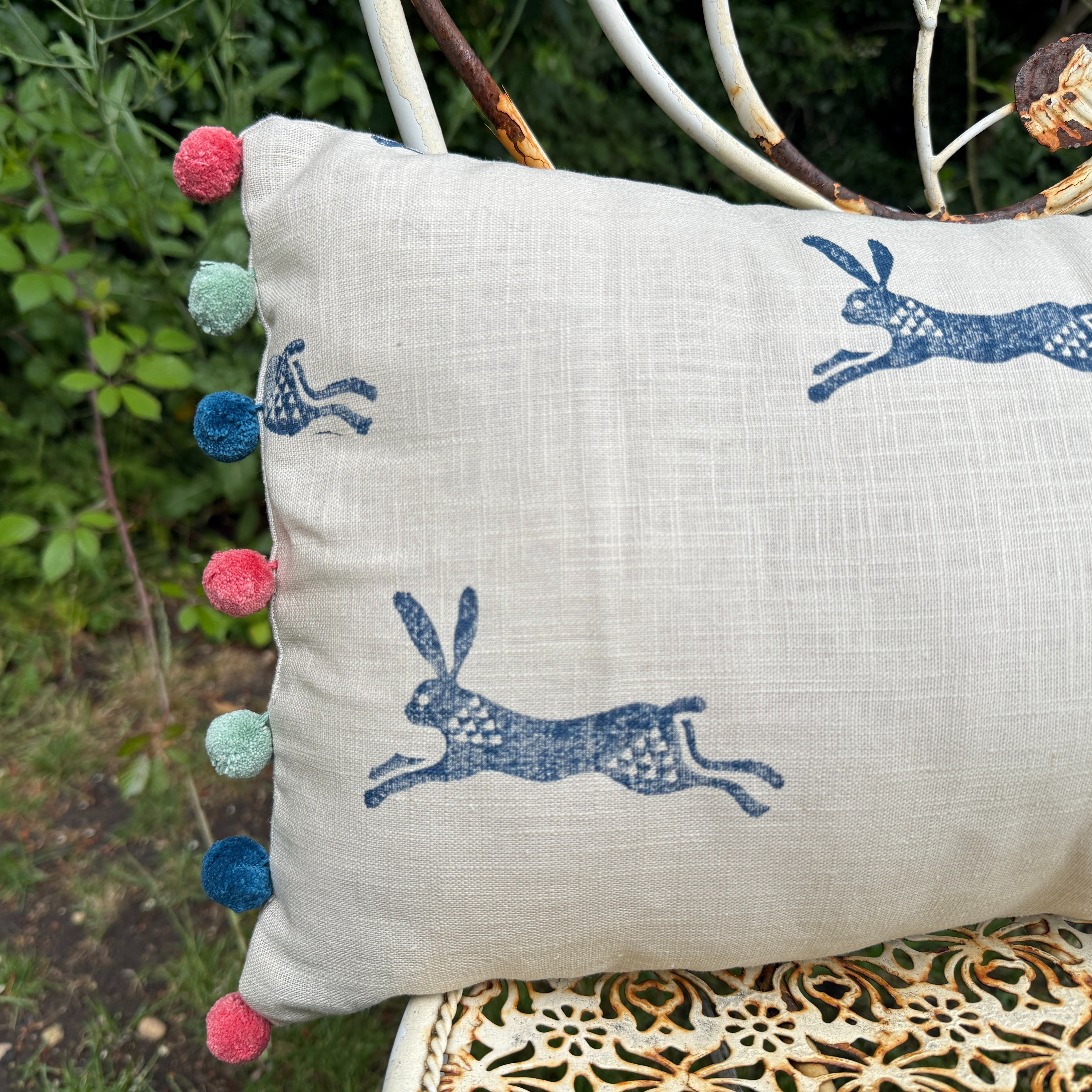 Running Hare Cushion - Pink, Navy & Aqua Pom Poms