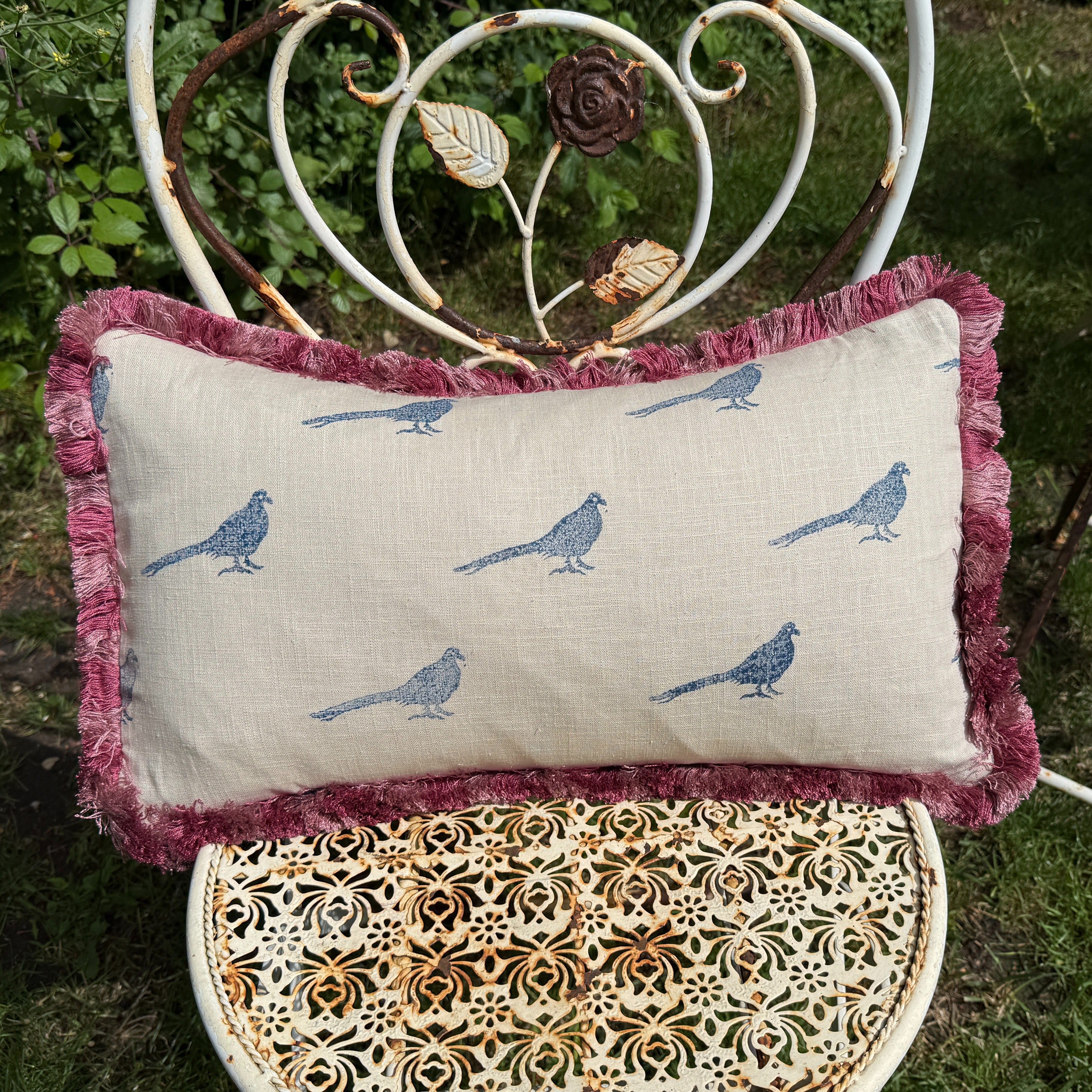 The Bold Pheasant Cushion - Navy and Pink Fringe