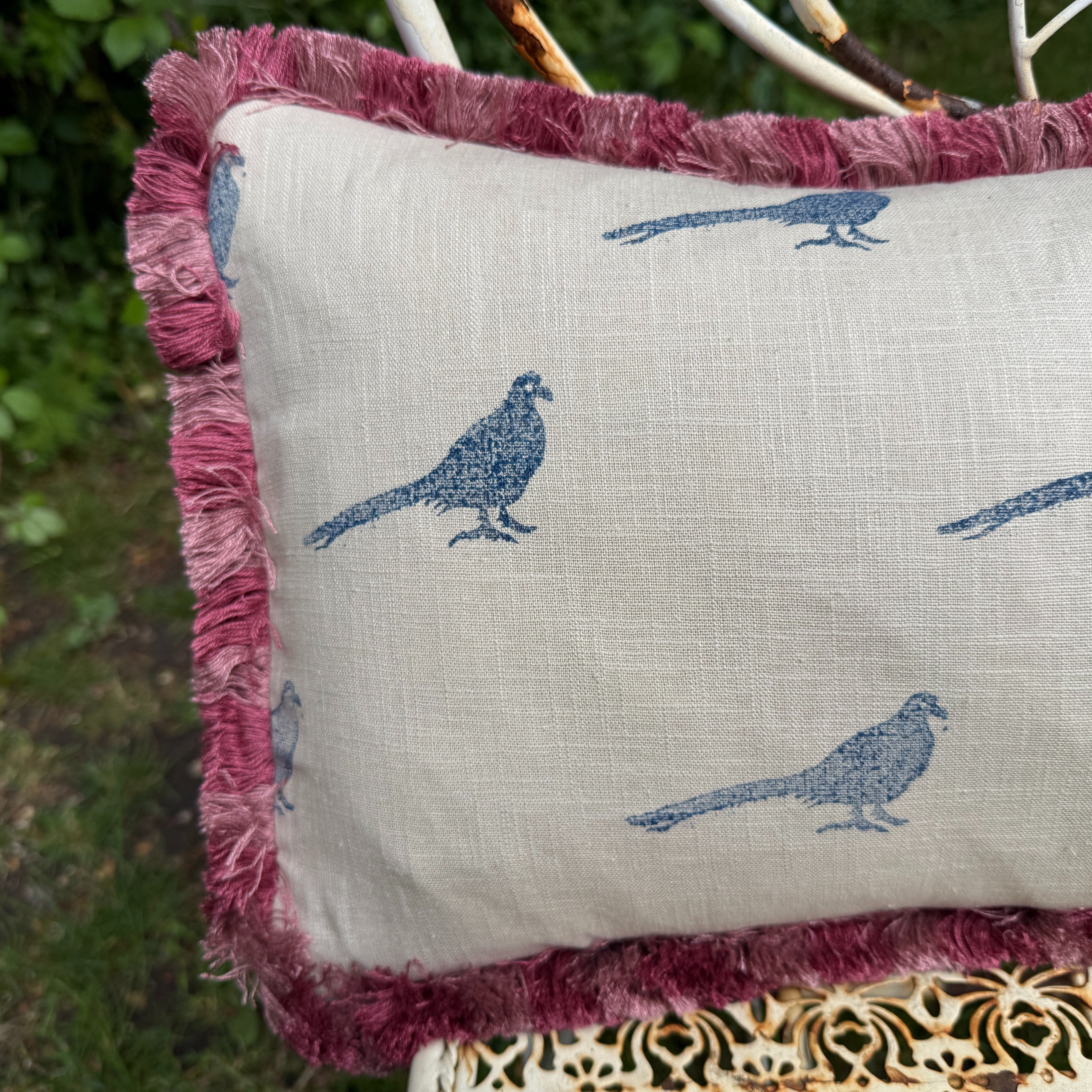 The Bold Pheasant Cushion - Navy and Pink Fringe